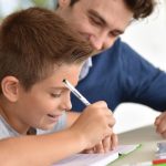 Schoolboy doing homework